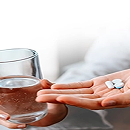 Medication with a glass of water
